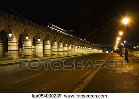 Stock Photo - France, Paris, street along the Pont de Bercy. Fotosearch