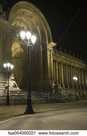 Stock Image - France, Paris, The Louvre at night. Fotosearch