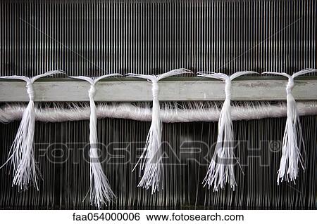 Loom in weaving mill, close-up of weaving reed View Large Photo Image Stock Photograph - Loom in weaving mill, close-up of weaving reed. Fotosearch
