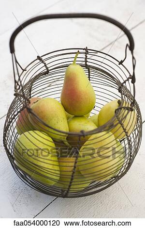 Pears in wire basket View Large Photo Image Stock Image - Pears in wire basket. Fotosearch