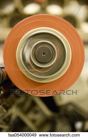 Recyclable composite textile fabrication department of factory, thread coating machine View Large Photo Image Stock Photo - Recyclable composite textile fabrication department of factory, thread coating machine. Fotosearch
