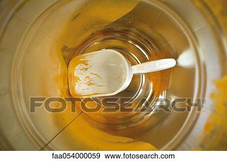 Stock Photo - Recyclable composite textile fabrication department of factory, powdered dye for the PVC granules. Fotosearch