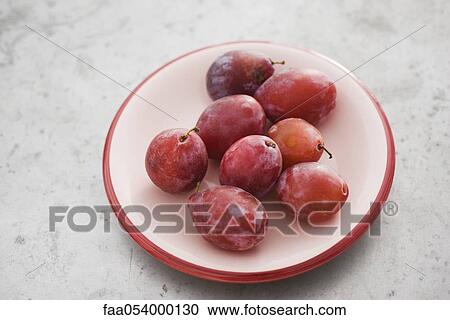 Stock Image - Ripe plums. Fotosearch