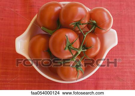 Ripe vine tomatoes in bowl View Large Photo Image Picture - Ripe vine tomatoes in bowl. Fotosearch