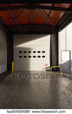 Stock Photo - Roll-up door of warehouse. Fotosearch