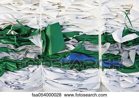 Stock Photo - Storage of bales of PVC sheeting for recycling. Fotosearch