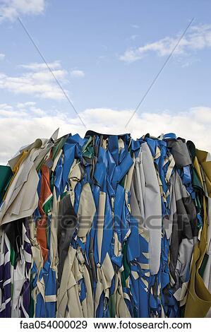 Stock Photo - Storage of bales of PVC sheeting for recycling. Fotosearch