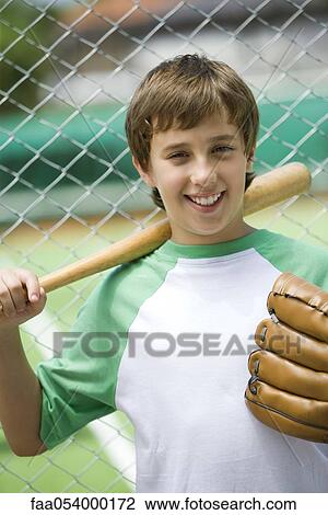 Young baseball player, portrait View Large Photo Image Stock Image - Young baseball player, portrait. Fotosearch