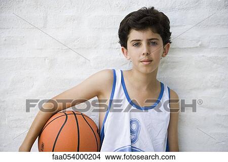 Picture - Young basketball player, portrait. Fotosearch