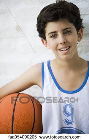 Young basketball player, portrait View Large Photo Image Stock Photography - Young basketball player, portrait. Fotosearch