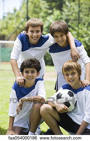 Stock Photograph - Young soccer teammates, portrait. Fotosearch