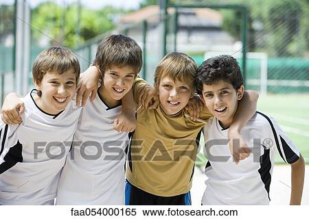 Young soccer teammates together, portrait View Large Photo Image Stock Photography - Young soccer teammates together, portrait. Fotosearch