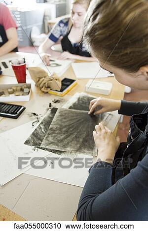 Stock Image - Art students drawing with charcoal. Fotosearch