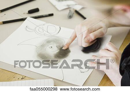 Artist drawing with charcoal View Large Photo Image Stock Photo - Artist drawing with charcoal. Fotosearch