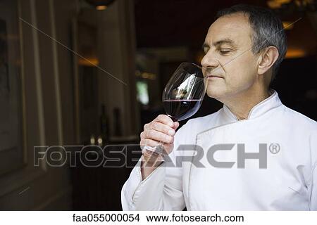 Chef appreciating wine bouquet View Large Photo Image Picture - Chef appreciating wine bouquet. Fotosearch