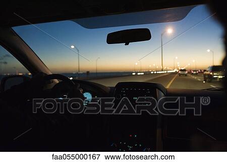 Driving at dusk View Large Photo Image Stock Photo - Driving at dusk. Fotosearch