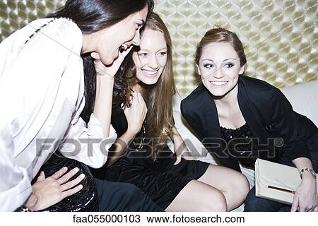 Friends having fun together at nightclub View Large Photo Image Stock Image - Friends having fun together at nightclub. Fotosearch