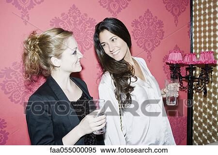 Friends together at nightclub View Large Photo Image Stock Photography - Friends together at nightclub. Fotosearch