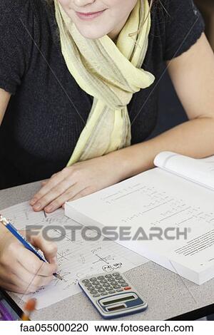 High school student completing classwork View Large Photo Image Stock Image - High school student completing classwork. Fotosearch