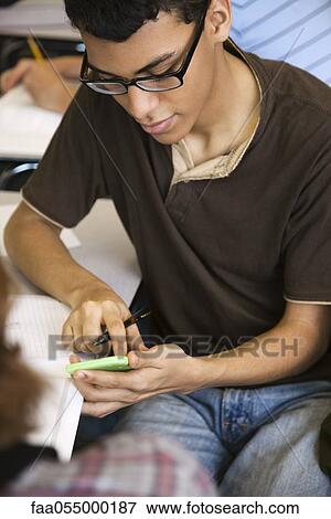 High school student using calculator in class View Large Photo Image Stock Photo - High school student using calculator in class. Fotosearch