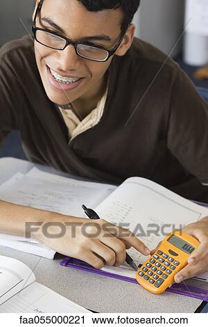 High school student using calculator View Large Photo Image Stock Image - High school student using calculator. Fotosearch
