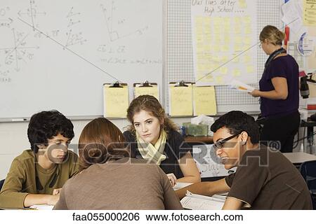 High school students studying together in class View Large Photo Image Stock Photograph - High school students studying together in class. Fotosearch