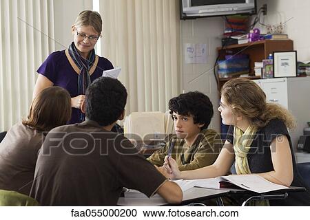 High school teacher leading study group View Large Photo Image Stock Image - High school teacher leading study group. Fotosearch