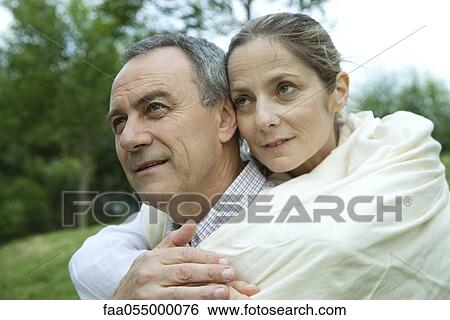Mature couple embracing, portrait View Large Photo Image Stock Photograph - Mature couple embracing, portrait. Fotosearch