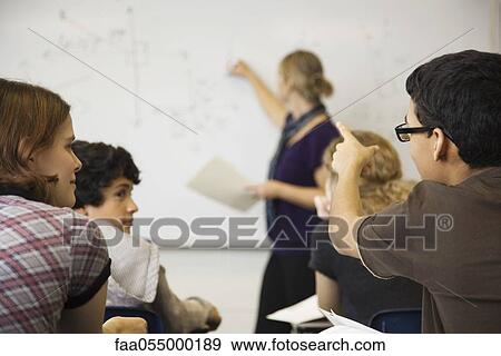 Student explaining concept in class View Large Photo Image Stock Photo - Student explaining concept in class. Fotosearch