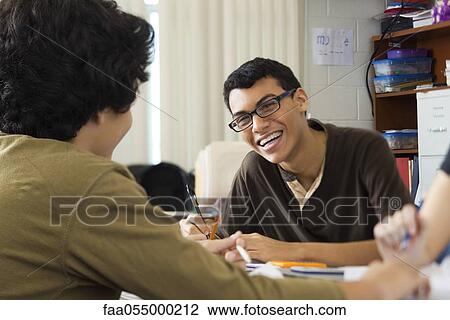 Student laughing with fellow classmates View Large Photo Image Stock Image - Student laughing with fellow classmates. Fotosearch