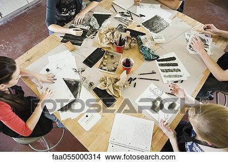 Picture - Students drawing with charcoal in art class. Fotosearch