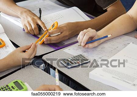 Students studying math together View Large Photo Image Stock Photo - Students studying math together. Fotosearch