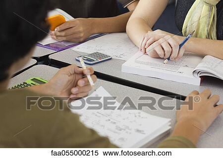 Students studying mathematics, cropped View Large Photo Image Stock Photography - Students studying mathematics, cropped. Fotosearch