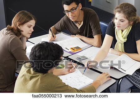 Stock Image - Students studying together. Fotosearch