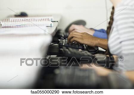 Students typing on keyboards View Large Photo Image Stock Image - Students typing on keyboards. Fotosearch