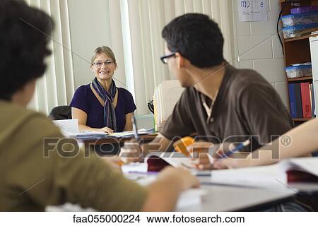Picture - Teacher and high school students in class. Fotosearch
