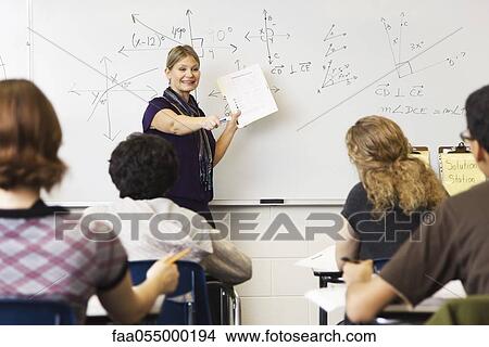 Picture - Woman teaching geometry class. Fotosearch