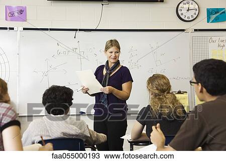 Woman teaching high school mathematics class View Large Photo Image Stock Image - Woman teaching high school mathematics class. Fotosearch