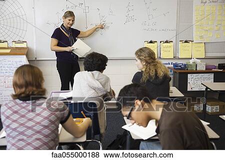 Woman teaching mathematics to high school students View Large Photo Image Stock Photo - Woman teaching mathematics to high school students. Fotosearch