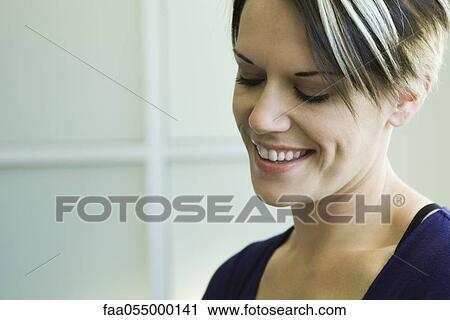 Stock Image - Young woman, portrait. Fotosearch