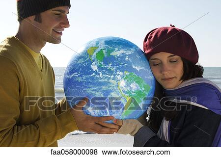 Ecology concept, protecting the earth View Large Photo Image Stock Photo - Ecology concept, protecting the earth. Fotosearch