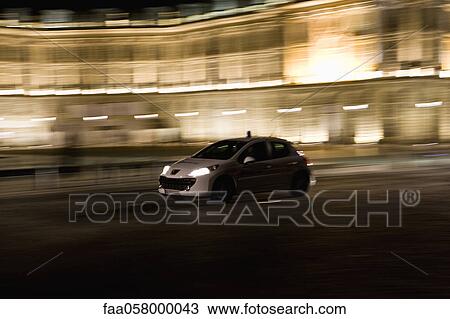 Emergency medical car driving at night View Large Photo Image Stock Image - Emergency medical car driving at night. Fotosearch