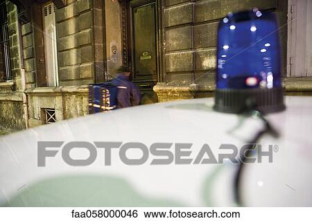 Emergency on-call doctor making a house call View Large Photo Image Stock Photograph - Emergency on-call doctor making a house call. Fotosearch