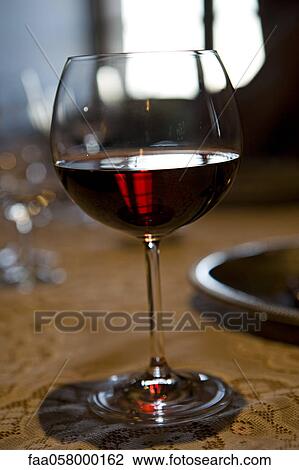 Glass of red wine View Large Photo Image Stock Image - Glass of red wine. Fotosearch