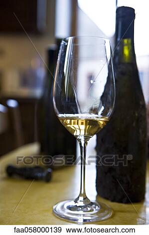 Glass of white wine View Large Photo Image Stock Photo - Glass of white wine. Fotosearch