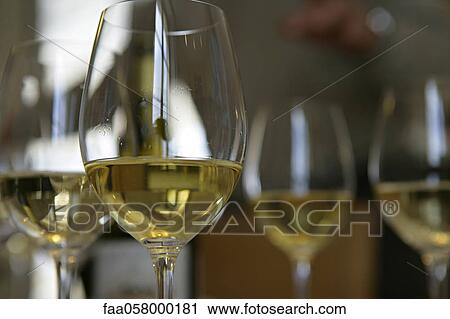 Glasses of white wine View Large Photo Image Stock Image - Glasses of white wine. Fotosearch