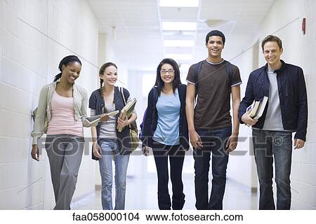 High school students walking down school corridor View Large Photo Image Picture - High school students walking down school corridor. Fotosearch
