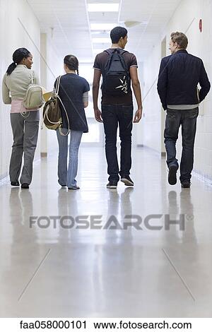 High school students walking down school corridor, rear view View Large Photo Image Stock Image - High school students walking down school corridor, rear view. Fotosearch