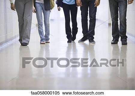 Legs of high school students walking down school corridor View Large Photo Image Stock Photography - Legs of high school students walking down school corridor. Fotosearch