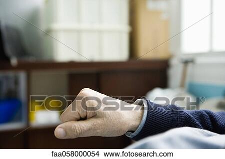 Man's hand making a fist View Large Photo Image Picture - Man's hand making a fist. Fotosearch